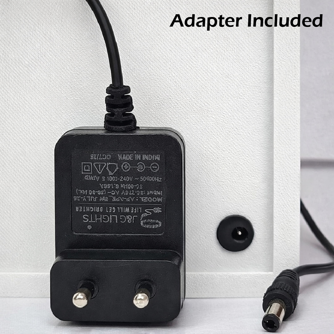 Black power adapter with cable on a white background, labeled 'Adapter Included'.
