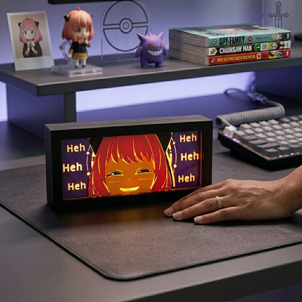 Small screen displaying an animated character with a hand interacting with it on a desk.