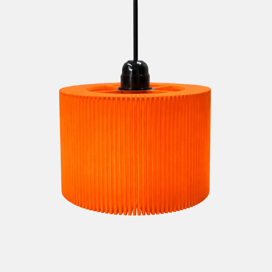 Orange pleated pendant lamp on a gray background