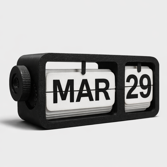Black flip clock displaying 'MAR 29' on a light gray background