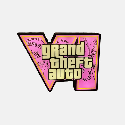 Pink 'Grand Theft Auto' box on a Christmas tree with wrapped presents underneath