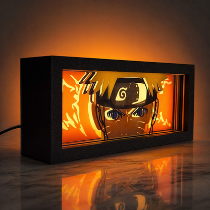 Light box with anime character design on a reflective surface