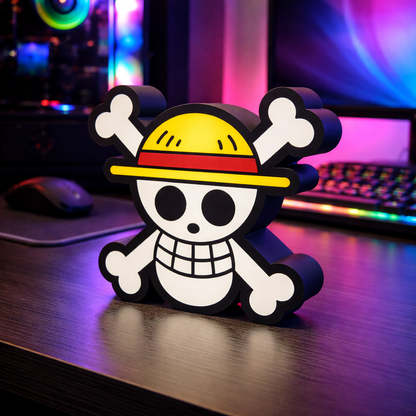 Skull with a yellow hat and crossed bones on a desk with colorful lighting