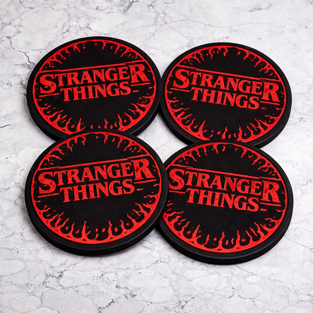 Four 'Stranger Things' coasters with red text on black background