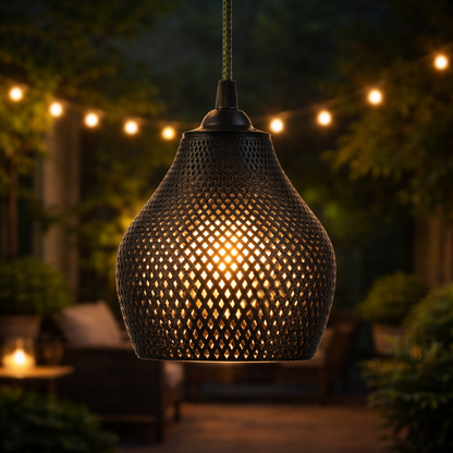 Woven outdoor pendant light with string lights in the background