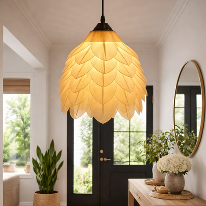 Decorative pendant light in a home interior setting with plants and a mirror.