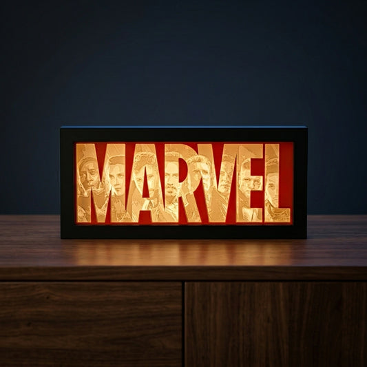 Marvel logo light box on a wooden surface with a dark background